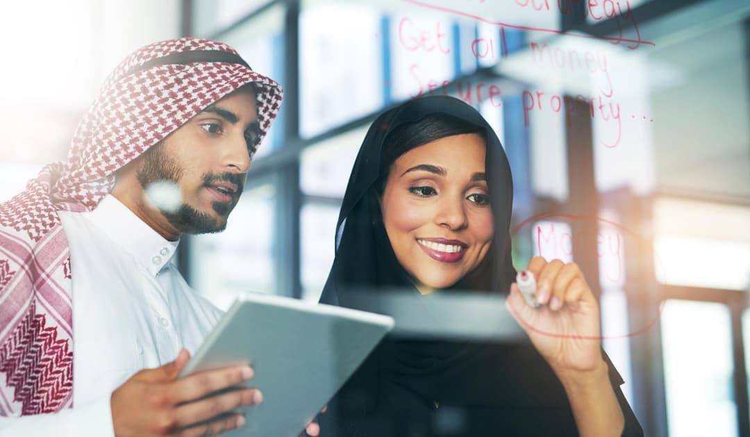 Business professionals collaborating on digital platform